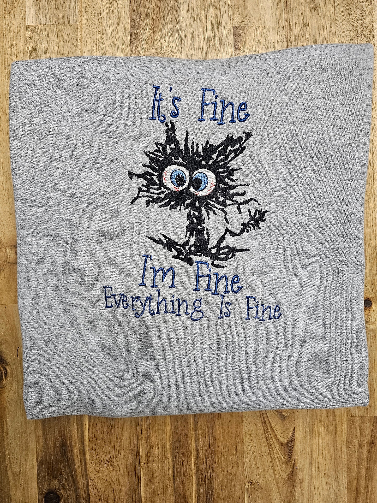 “It’s Fine, I’m Fine, Everything Is Fine” Embroidered Sweatshirt